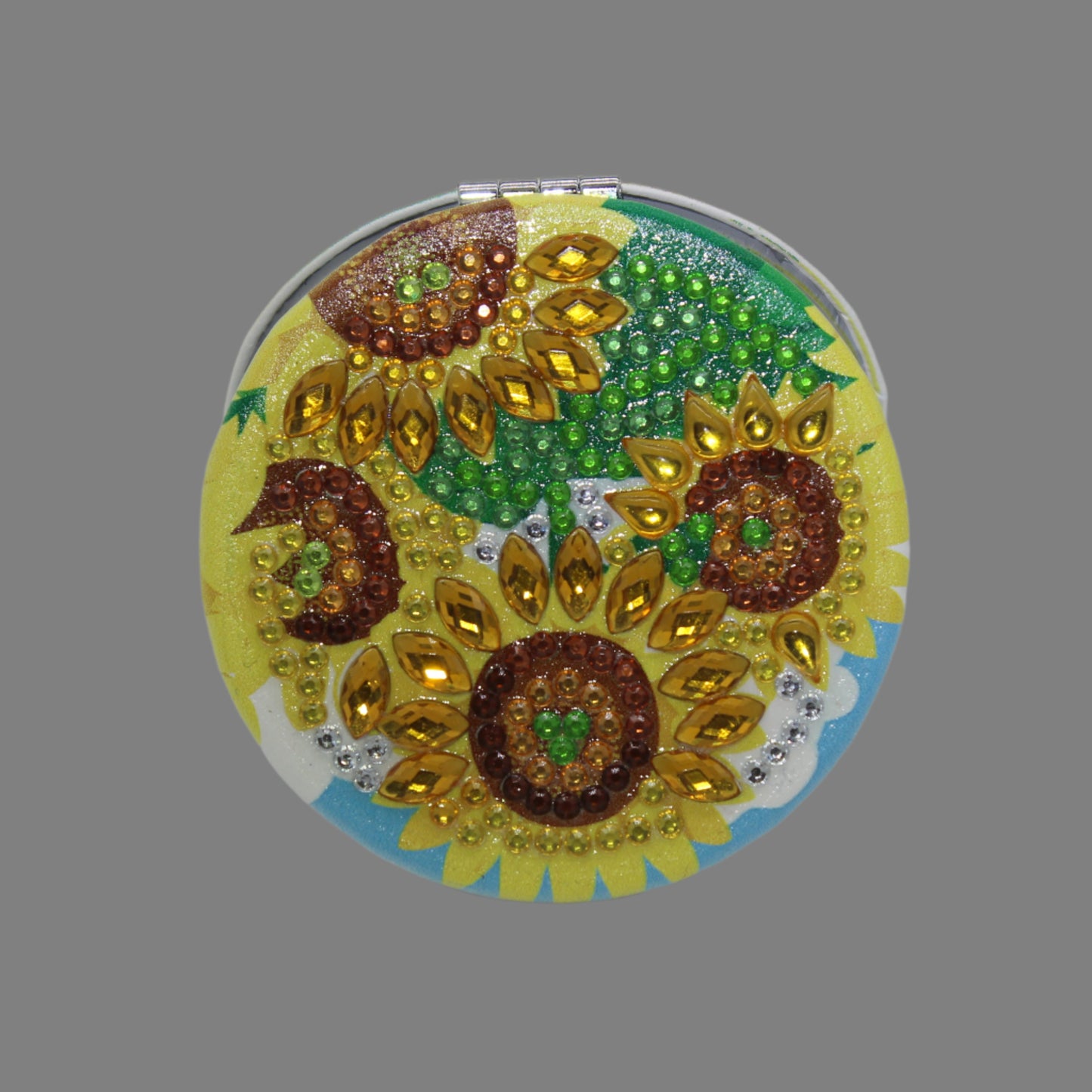 Stunning Round Shaped Compact with Sunflowers Yellow, Brown and Blue