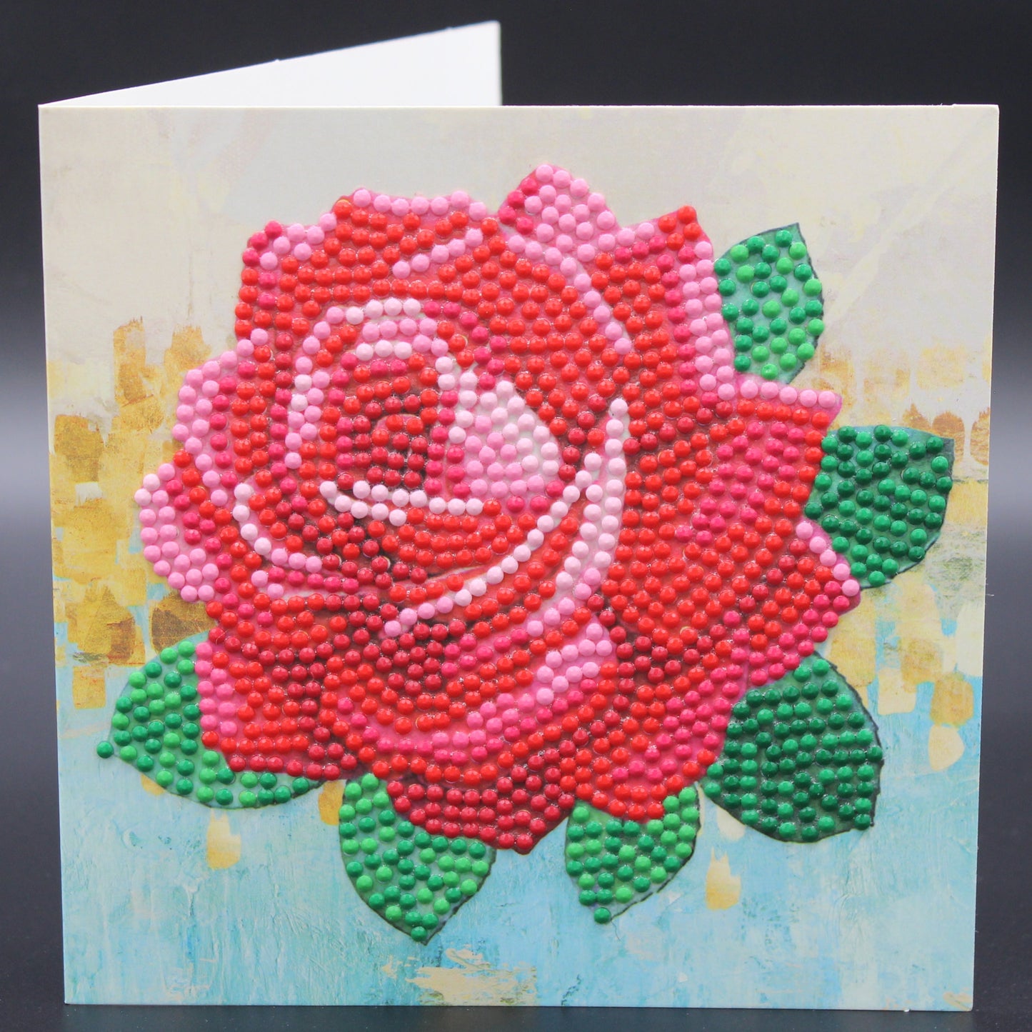 Huge Red, Yellow and Pink Roses with Foliage and Pearls. Crystal Rhinestones are so pretty. Great for Most Any Occasion