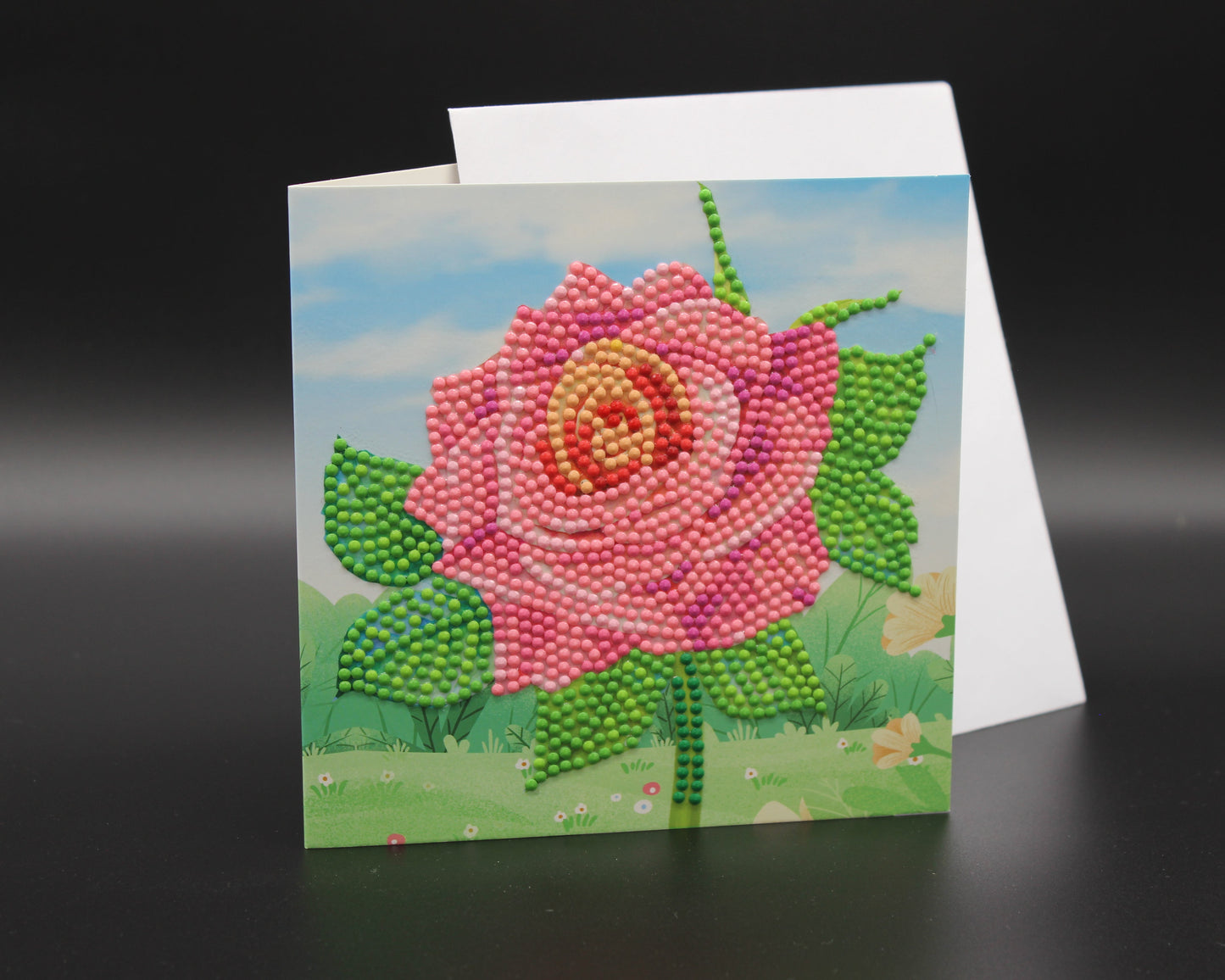 Huge Pink Singular Rose with Yellow Center and Foliage. Red, Green and Pink Crystal Rhinestones are so pretty