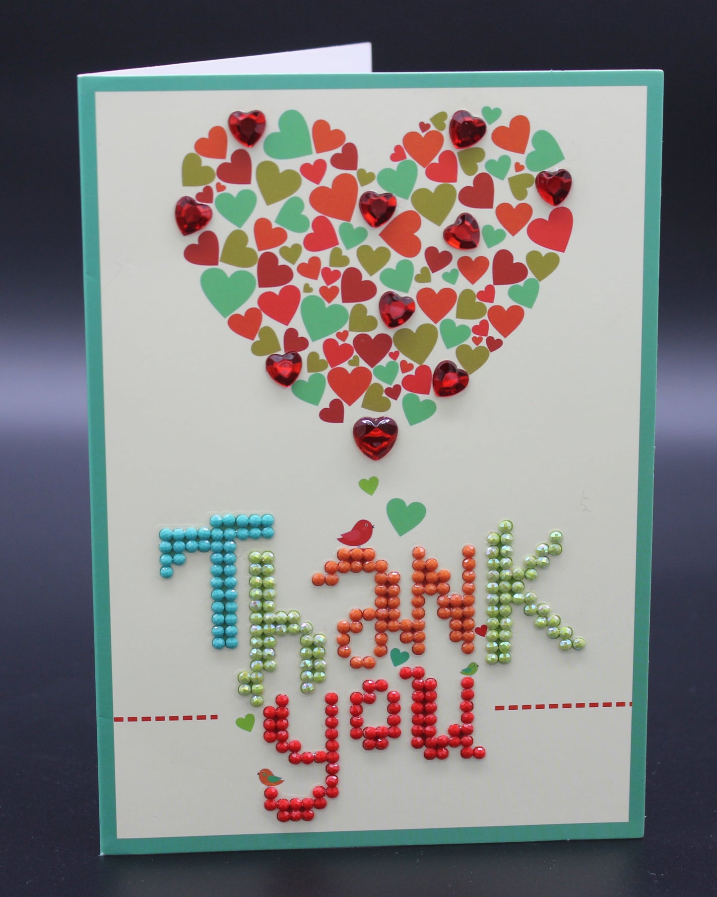 A Heart Says Thank You in a Mosaic ensemble Adorned with Ornate Red Hearts. Thank You Goes a Long Way. - Sealed