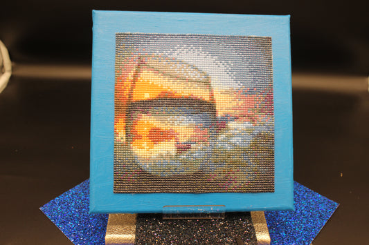 Diamond Art Painting of a Glass with Beautiful Sunset on a Hand Painted Background.