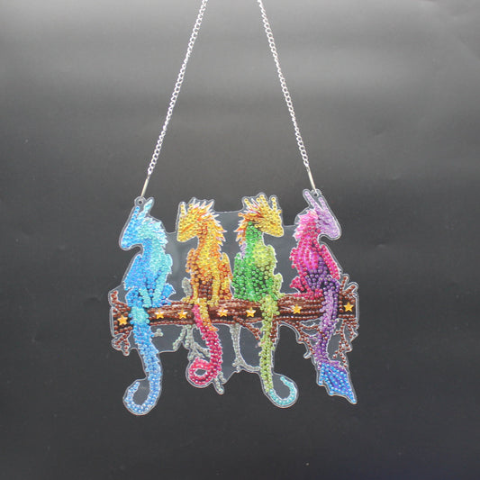 Diamond Art Hanging pendant with multi colored Dragons sitting on a log