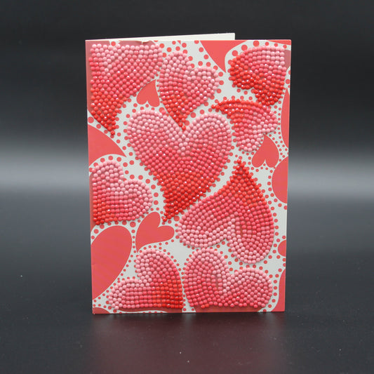 Wow! Hearts Galore. Give Your Person and Sweet Card.  So Pretty.  Adorned with Red and Pink Crystal Rhinestones.