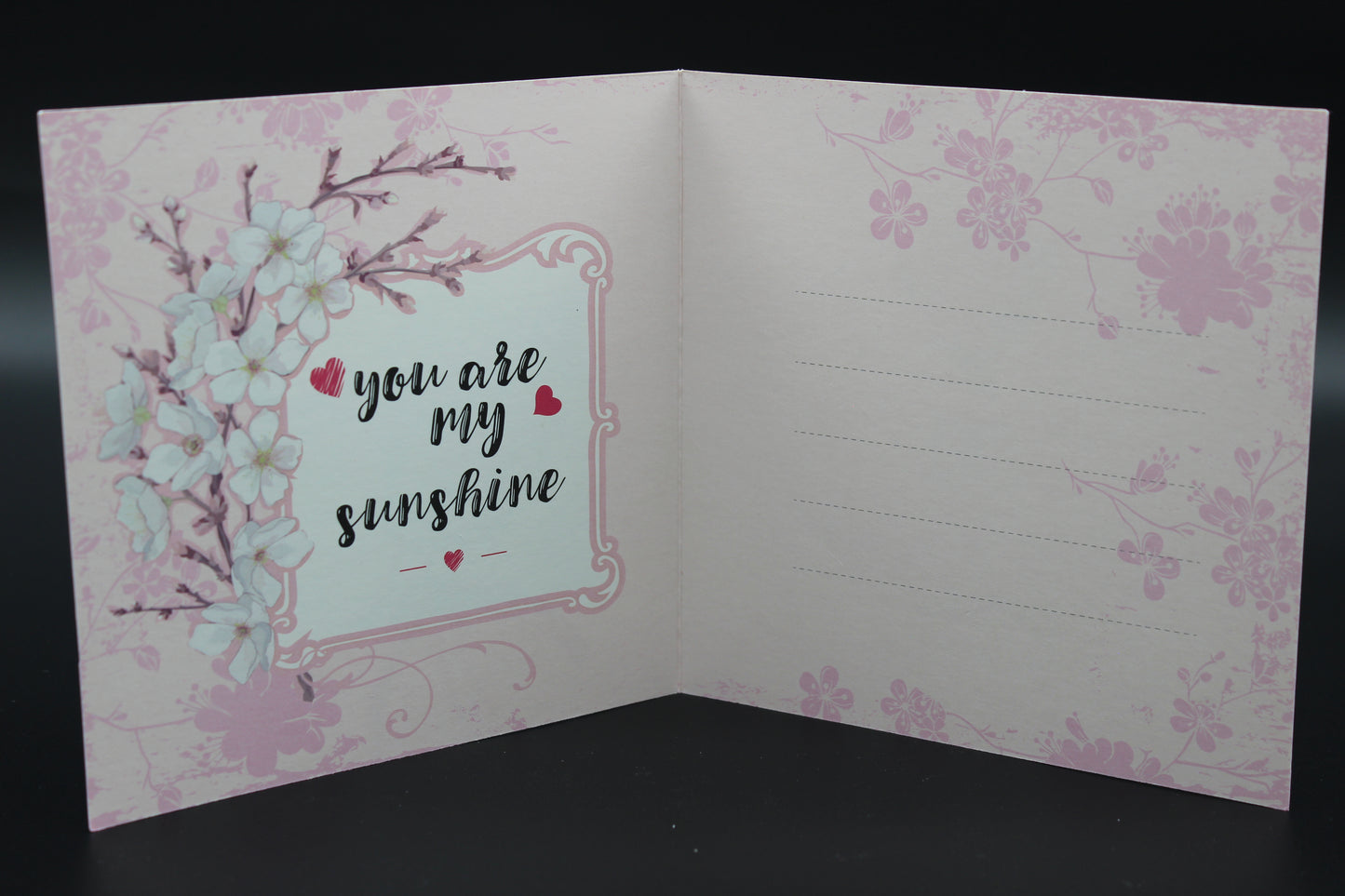 Greeting Card is Adorned with Charming Rhinestones Featuring a Carriage with a Basket of Ornate Flowers.