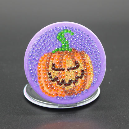 Round Shaped Halloween Compact Mirror with Scary Pumpkins in Orange, Black and Purple Crystal Rhinestones