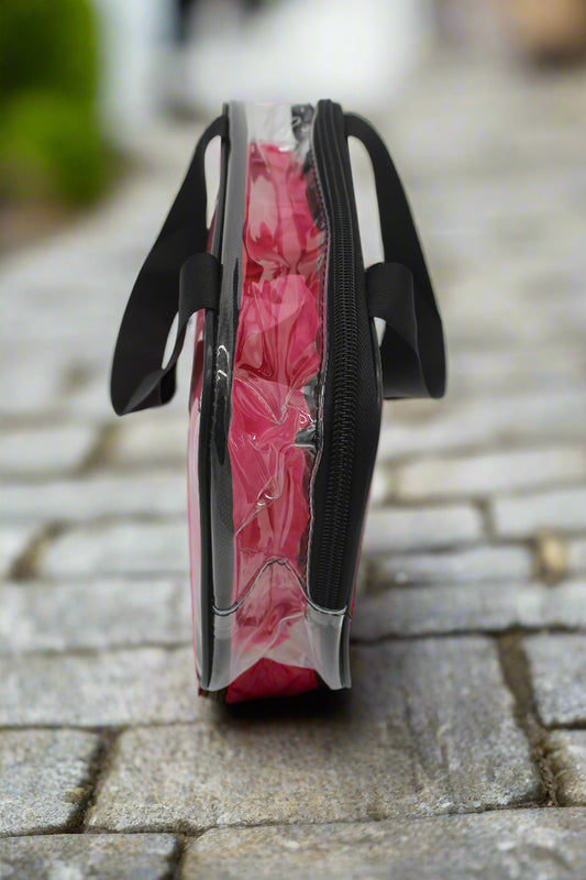 Clear waist bag with pink flowers on a light gray background