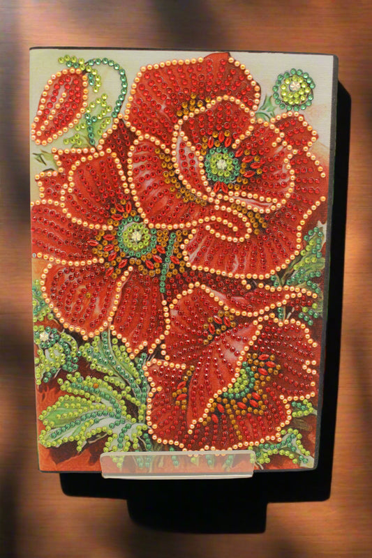 Decorative mat with red floral design on a beige background