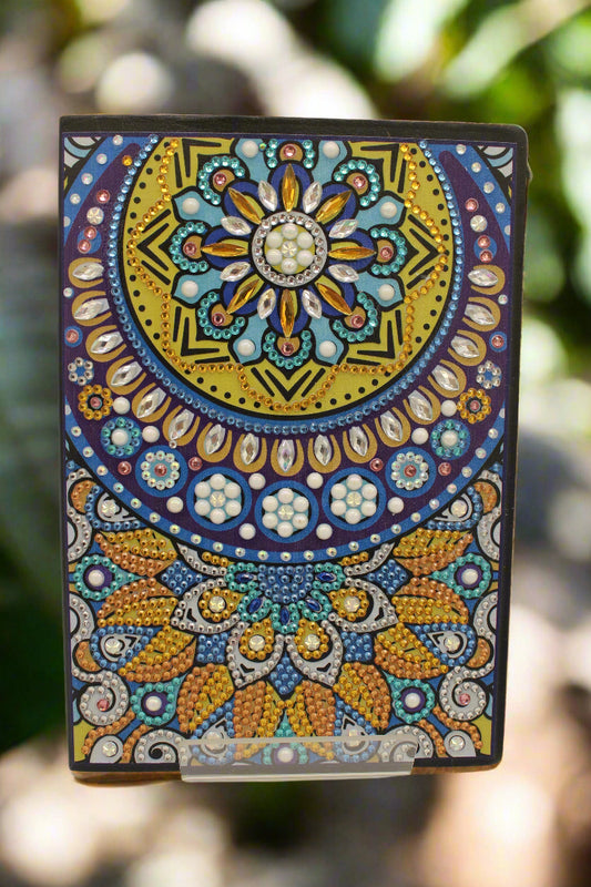Decorative card with mandala design on a beige background