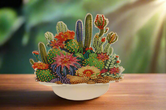 Colorful cactus arrangement on a beige background