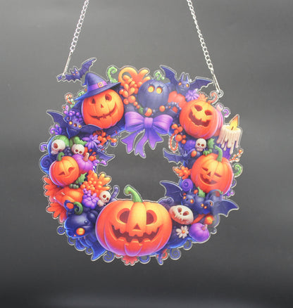 Halloween-themed wreath with pumpkins and ghosts on a black background