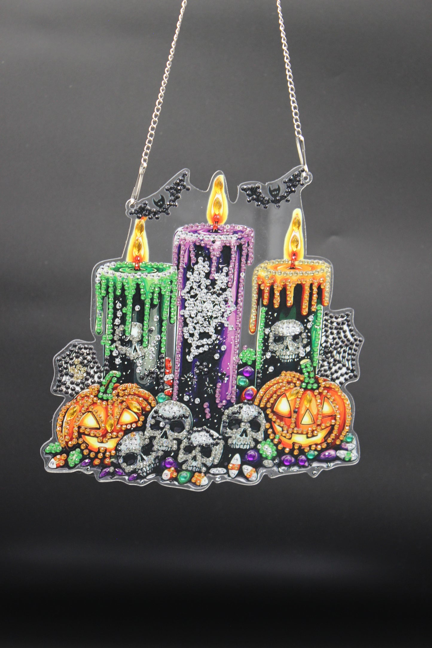 Decorative necklace with colorful beads on a dark background