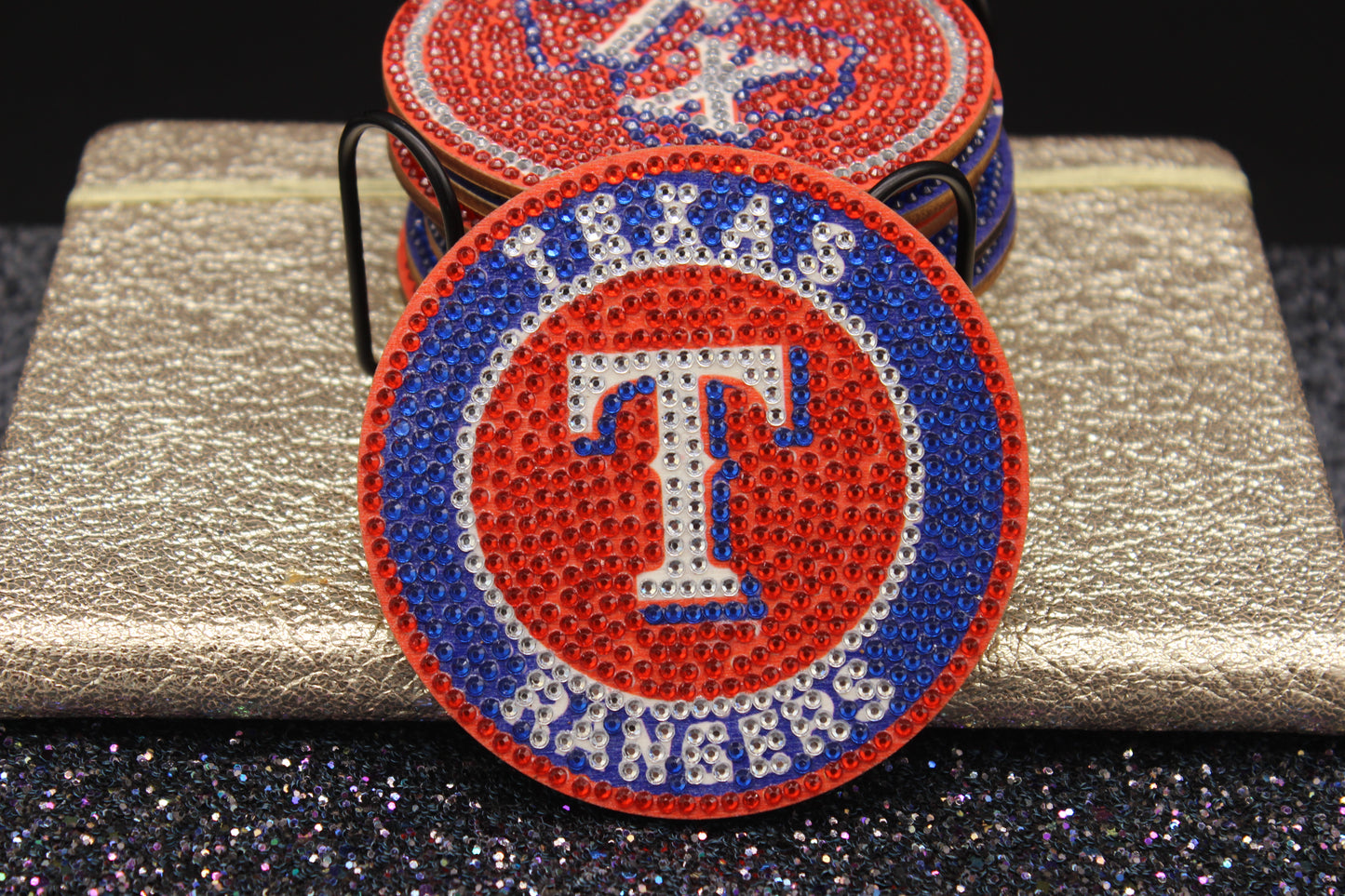 Texas Rangers logo patch on a metallic surface