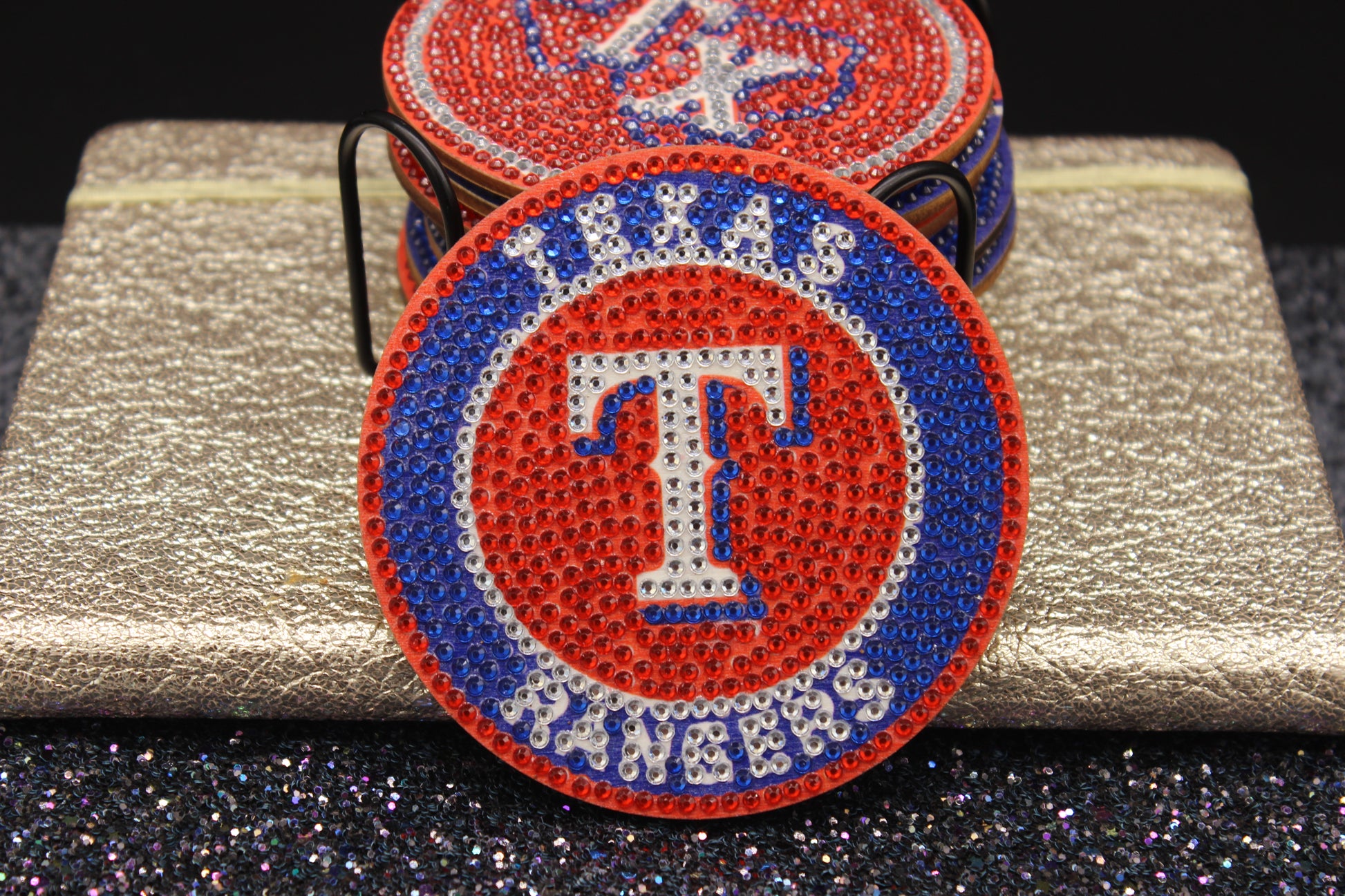 Texas Rangers logo patch on a metallic surface