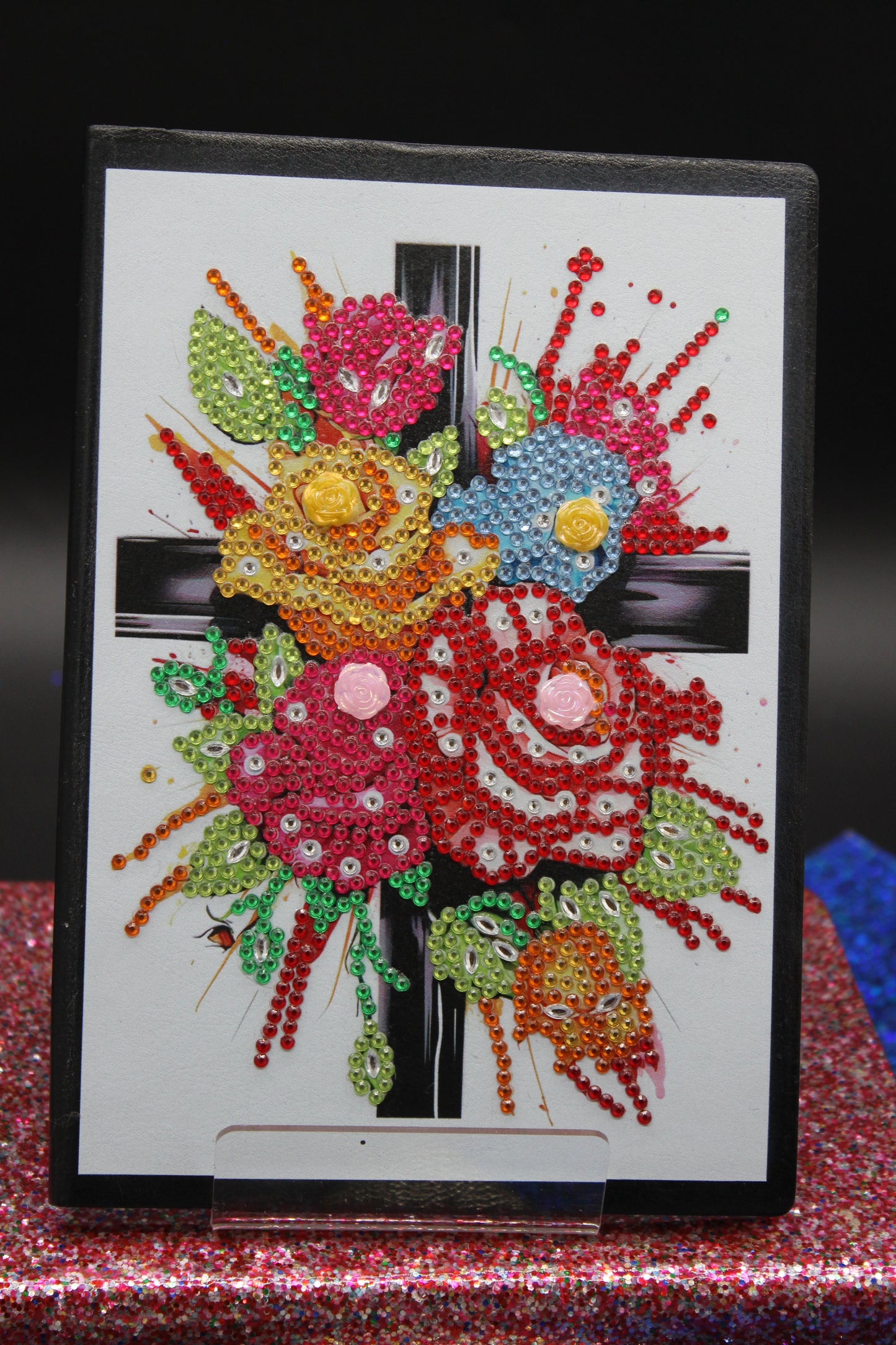 Diamond Art Journal With Multi Colored Flower Adorned to a Cross