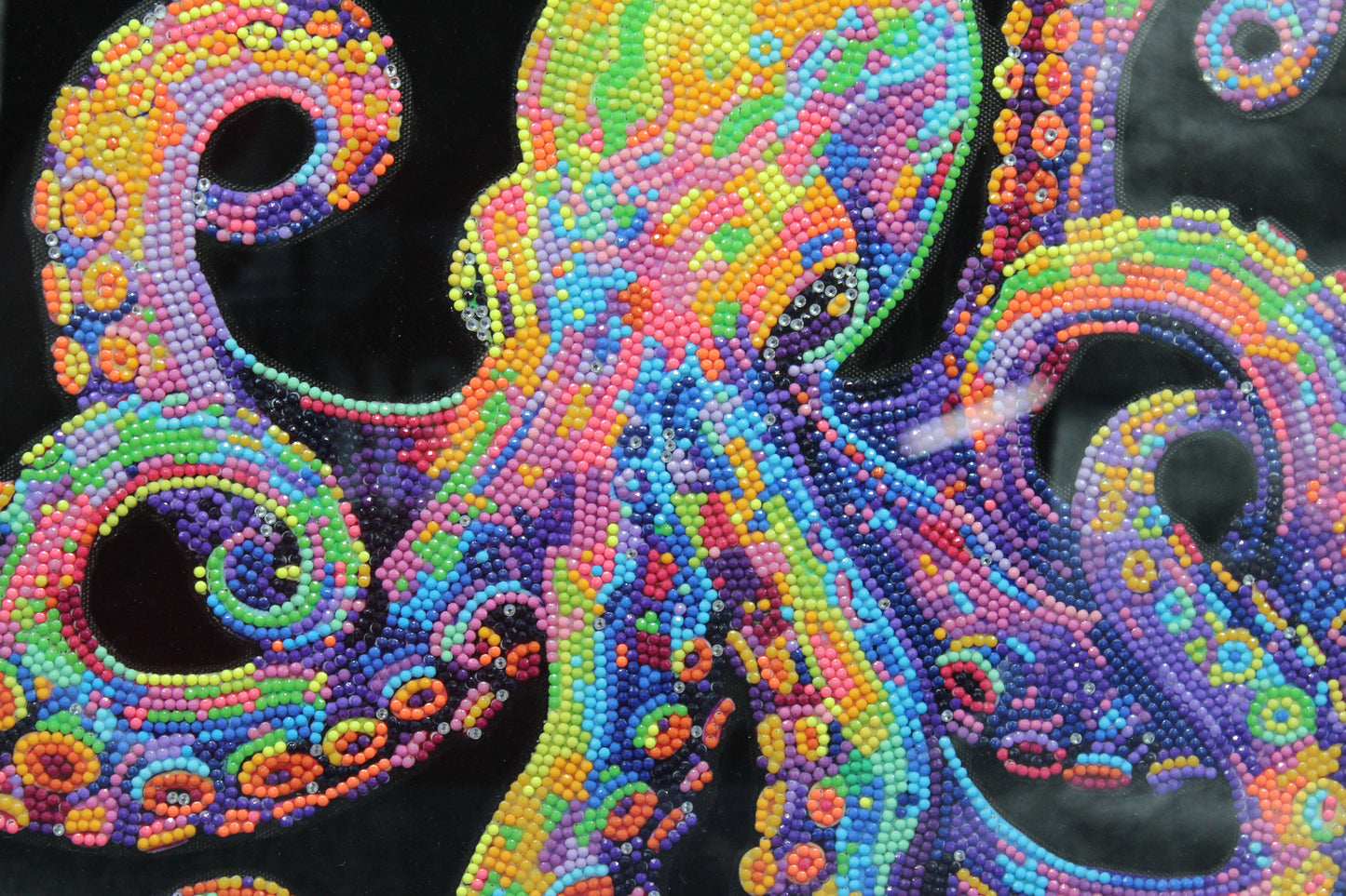 Diamond Art Picture of Multi Colored Octopus on a Black Felt Background