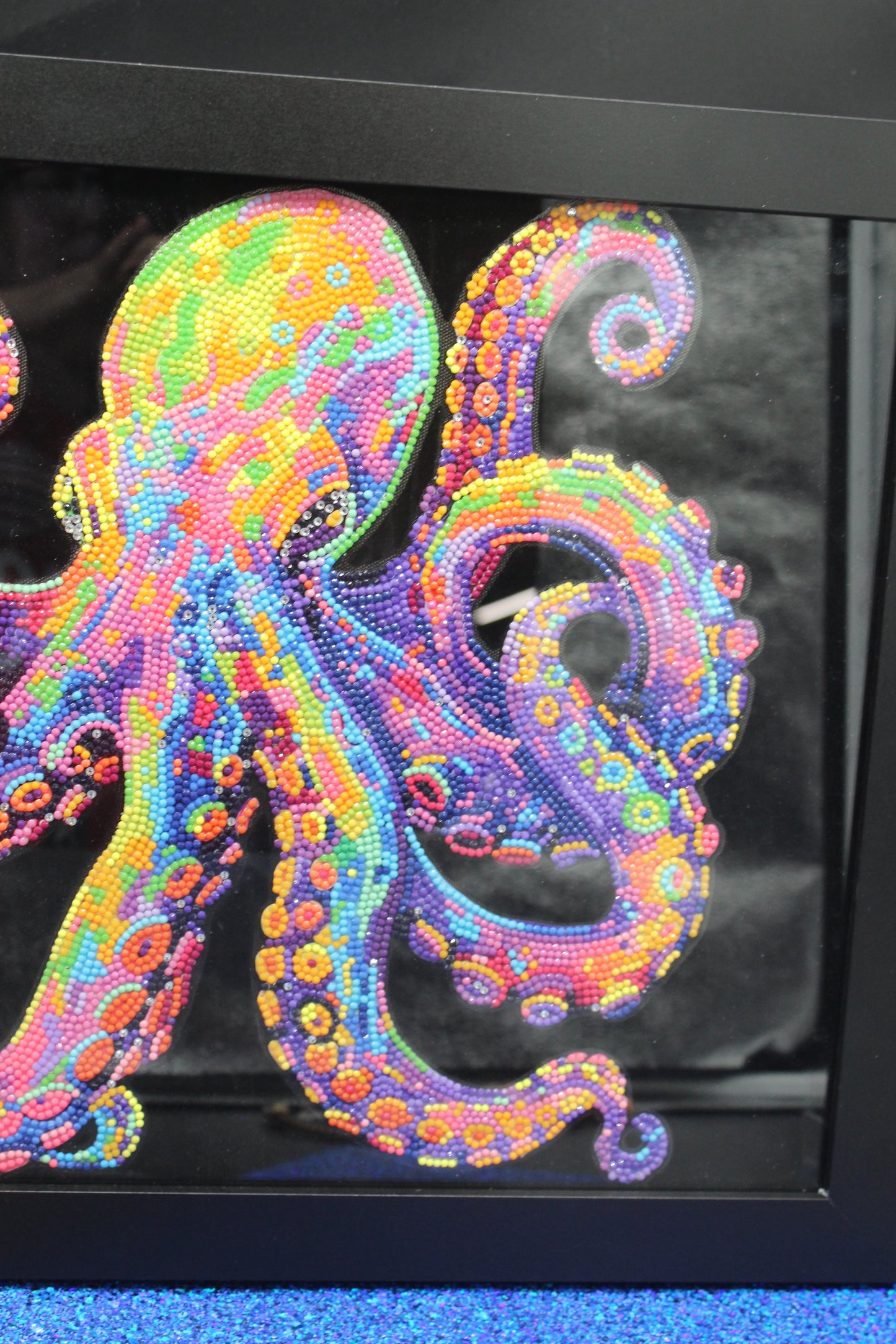 Diamond Art Picture of Multi Colored Octopus on a Black Felt Background