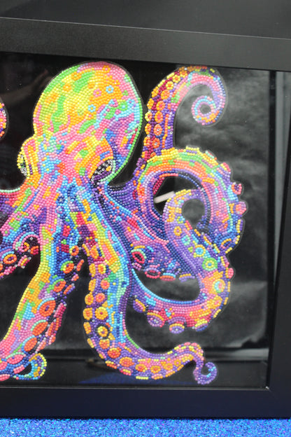 Diamond Art Picture of Multi Colored Octopus on a Black Felt Background