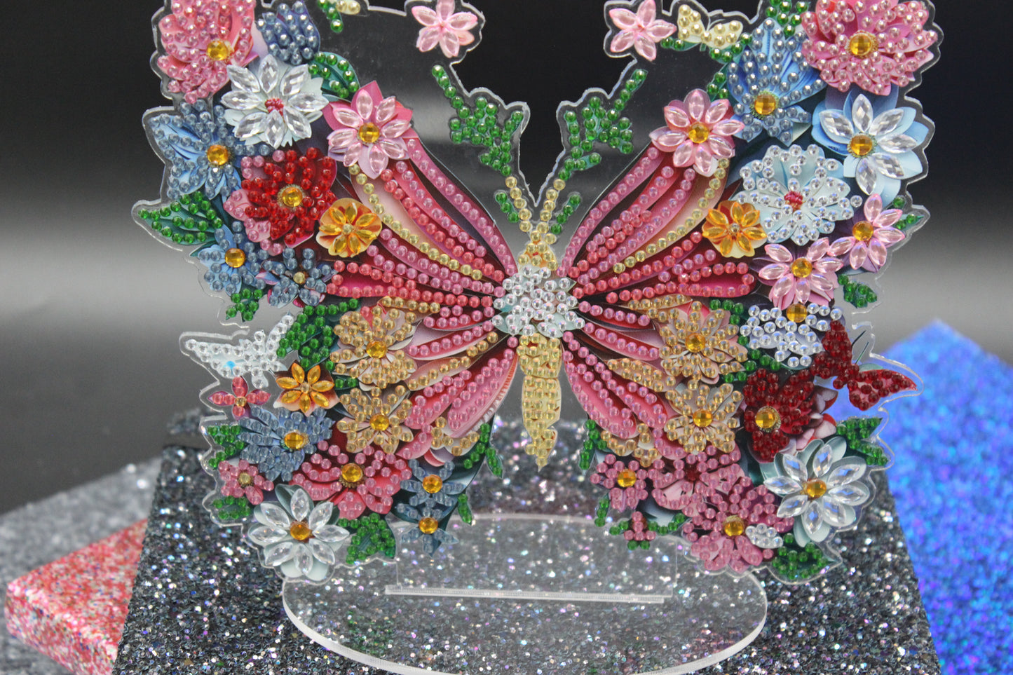 Beautiful Multi Colored Butterfly and Small Colorful Flowers
