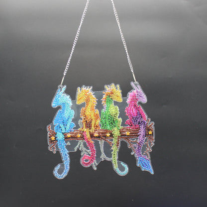 Diamond Art Hanging pendant with multi colored Dragons sitting on a log