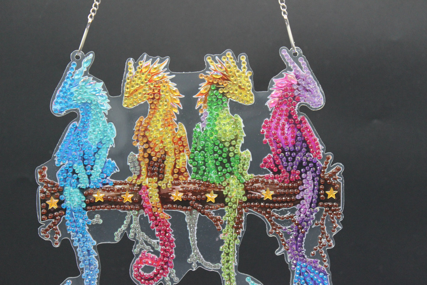 Diamond Art Hanging pendant with multi colored Dragons sitting on a log